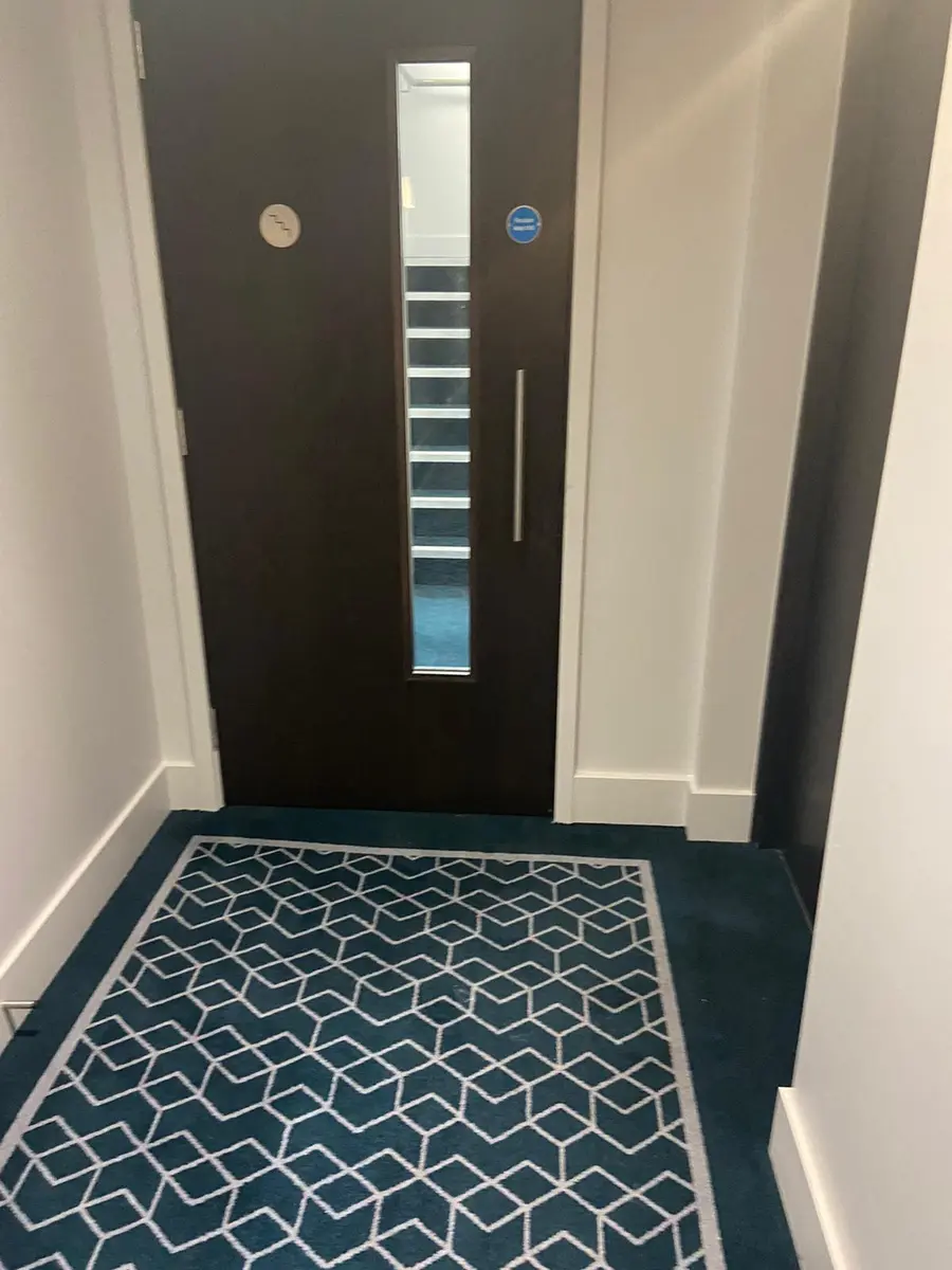 Clean communal stairwell in a London block of flats